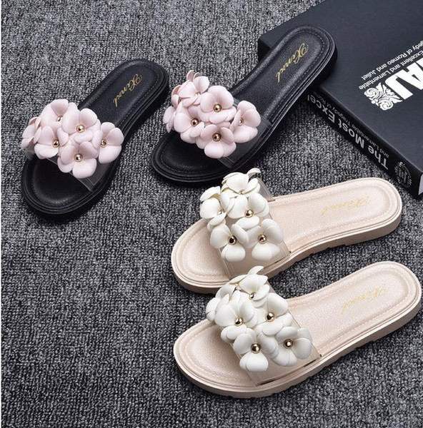 Free Camellia jelly slippers female summer waterproof flowers plastic sandals beach shoes crystal sandals female flat word