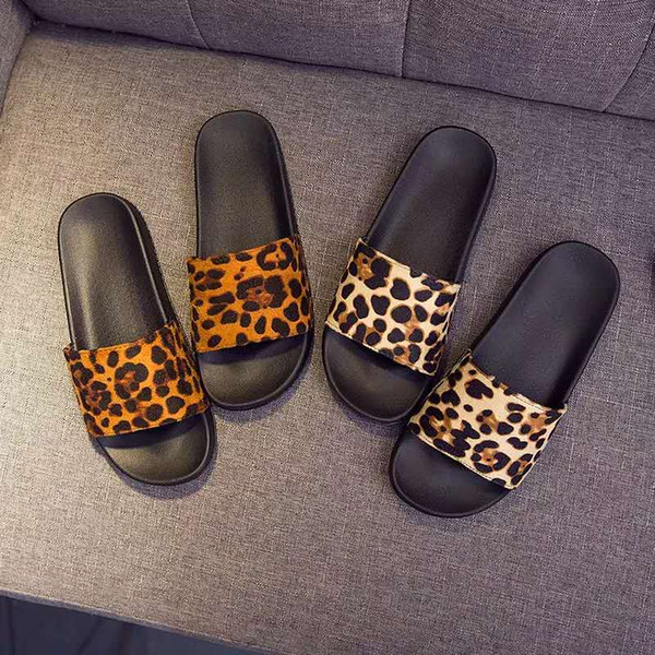 Leopard-print sexy retro-classic European and American one-word sandals for women in the new summer fashion of wearing a wide range of