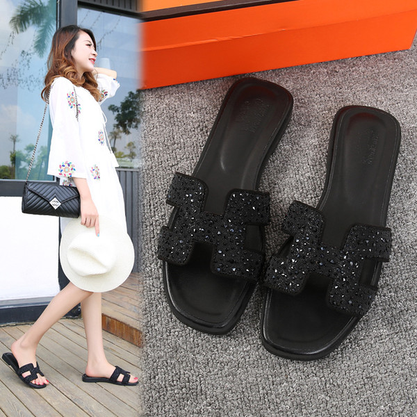 2018 Korean version of H slippers, summer fashion, wear a flat bottom lady's cool slippers. Slippers