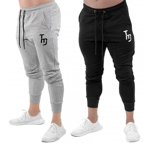 2018 New Print logo Gyms Men Joggers Casual Men Sweatpants Joggers Pantalon Homme Trousers Sporting Clothing Bodybuilding Pants s017