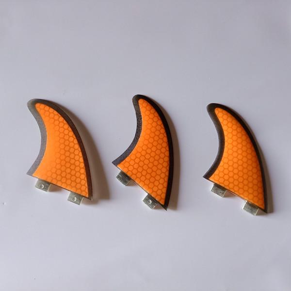 F C S fiberglass surf orange color honey comb with black edge fin tri surf fin middle fins