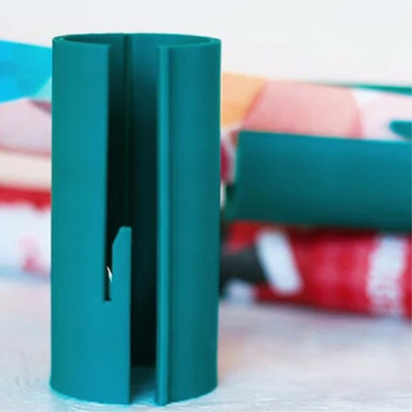 Hot New Little ELF Cutting Wrapping Paper Cutter Made Easy and Christmas Gift Wrapping Paper Cutter Showing Shelf
