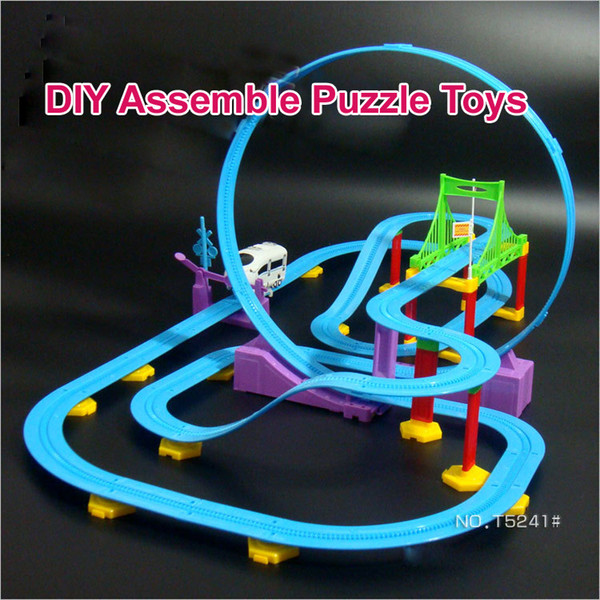 Free shipping Professional Kid Puzzle Toys Educational Soft Musical Plastic Assembly DIY Flexible Railway Train Toys For Boy