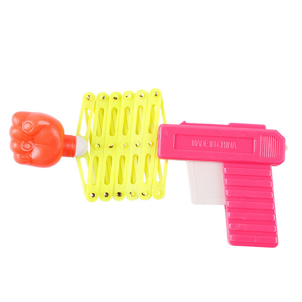 Free shipping Children fist gun Toy creative plastic spring Small gun Tricky interesting small toy Cute gift