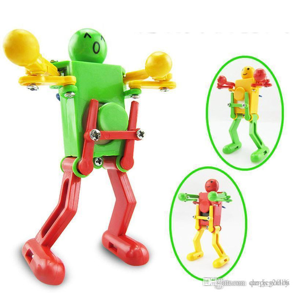 Walking Dancing Robots Toys 360 degrees Clockwork Wind Up Dancing Robot Toy For Baby Kids Developmental Gift Puzzle Christmas New Year Gifts