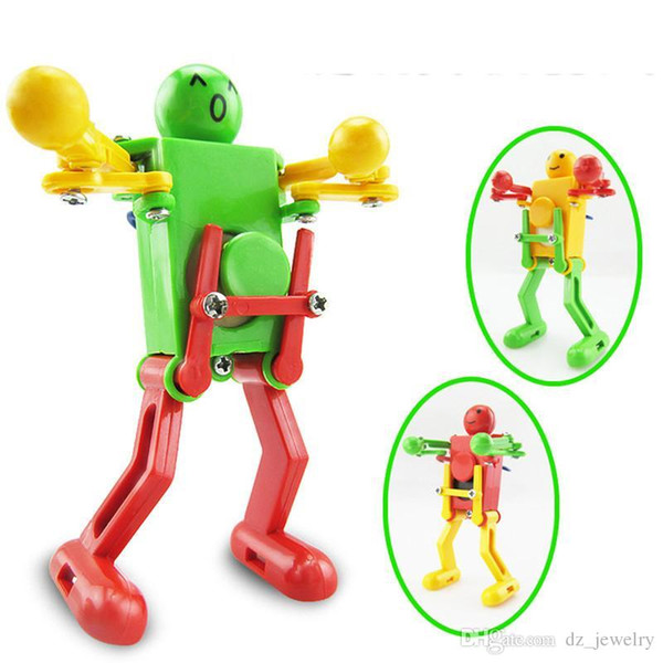 Walking Dancing Robots Toys 360 degrees Clockwork Wind Up Dancing Robot Toy For Baby Kids Developmental Gift Puzzle Christmas New Year Gifts