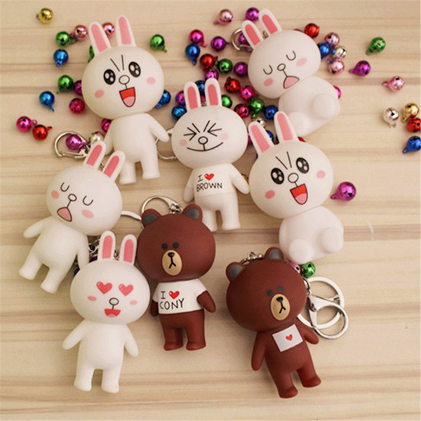 Popular cartoon and surprise doll action figure squishy cute little bear rabbit doll bell key ring couple pendant.