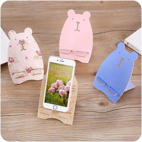 Wooden mobile holder cute cartoon (convenience and collapsible ) which can be used for watching TV