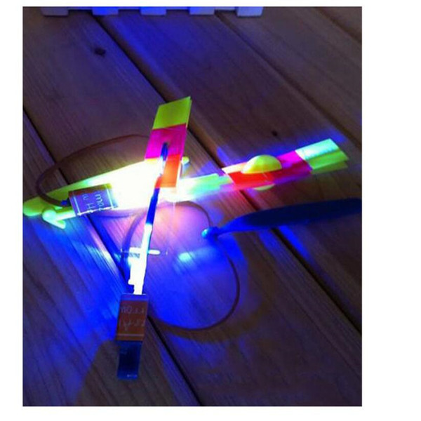 100pcs Flash Copter Amazing LED Light Up Arrow Rocket Helicopter Rotating Flying Toy Party Fun Gift Red and blue double flash