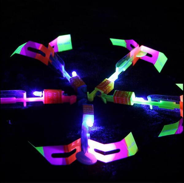 2015 LED Amazing flying arrows helicopter umbrella light parachute kids toys Space UFO LED Light Christmas Halloween Flash Toys