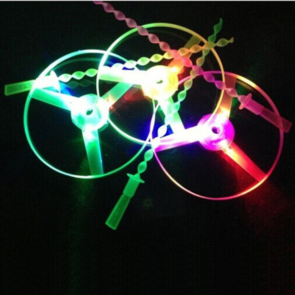 Mixed Luminous hand push flying round flying saucer top luminous bamboo dragonfly Frisbee toys Light-Up Toys