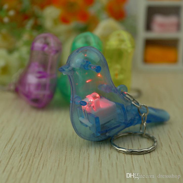 Luminous flash night market stall bird whistle small gifts creative couple key chain pendant pendant wholesale gift