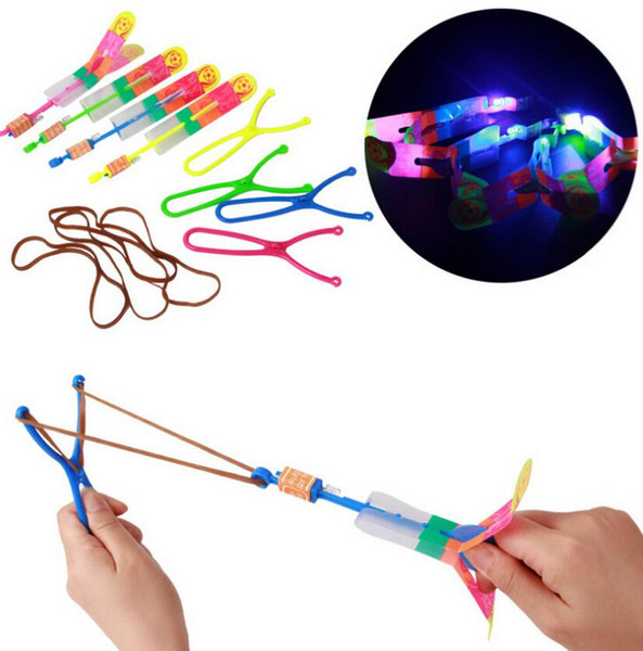 25pcs/lot Luminous Big Sling shot Catapult Arrows Flying Fairies Flash Helicopter Flying LED Light Emitting Slingshot Children's Toys