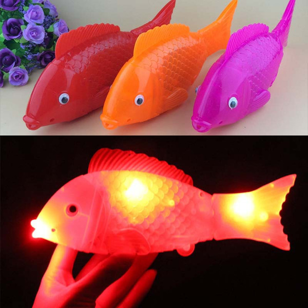 Novel creative music electric fish full - body luminous free swinging fish children toy night market square hot selling goods source