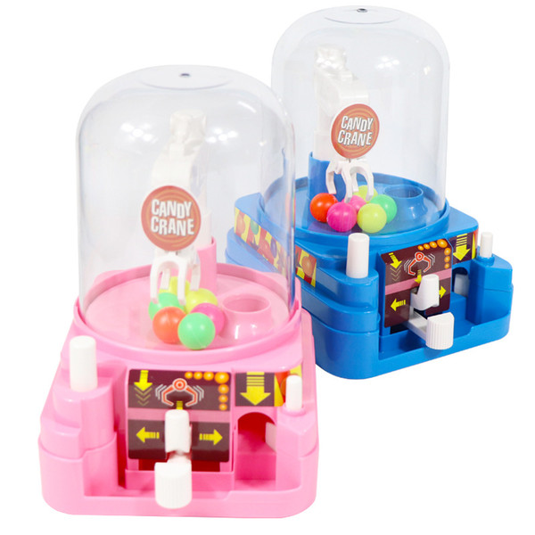 Child TOP Mini Electronic Claw Game toy grab win candy gum and small toys console music doll machine candy arcade gift toys