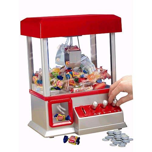 The Electronic Claw Game toy grab win candy gum and small toys console flashing sounding Put in the COINS candy arcade kids gift