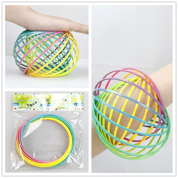 50 pcs Environmental Rainbow Color Toroflux Torofluxus Flowtoy Amazing Ring Toys Kinetic Spring Toys Funny Outdoor Game Intelligent Fidget