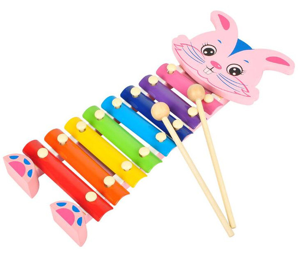Serinette white cartoon free hand knock piano music. Kindergarten children's wooden educational toys