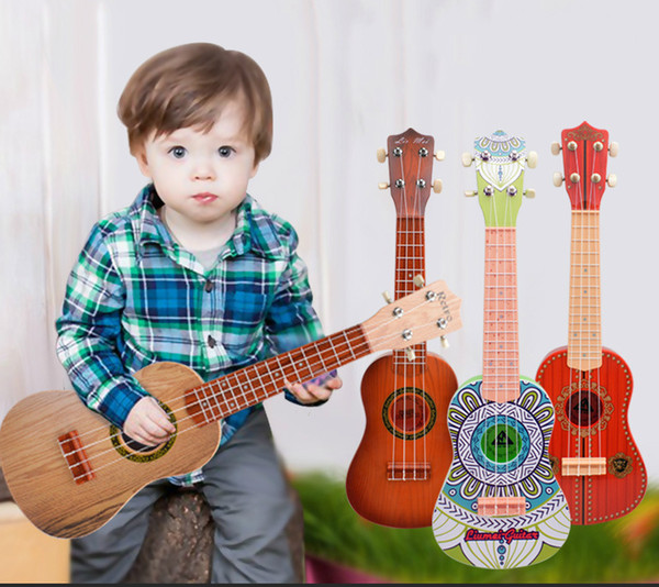 A beginner play guitar Four String child favor Guitar Toy six children 21 inch beauty instrument guita toy for kids