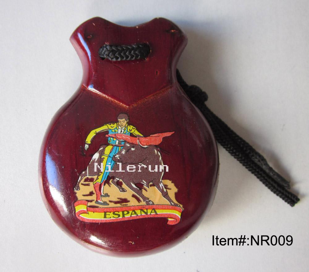 corrida bullfighting dark red Spanish wooden castanets