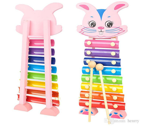 cute Percussion instruments. Serinette white cartoon free hand knock piano music. Kindergarten children's wooden educational toys
