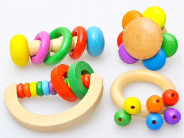 Factory direct flower-shaped Linglong bell children's toys rattan logs rainbow bells bells four 