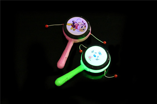 free shpping whilesale flashing Children's toys infant plastic rattle Bo Langgu cartoon flash light emitting hand drum traditional toys