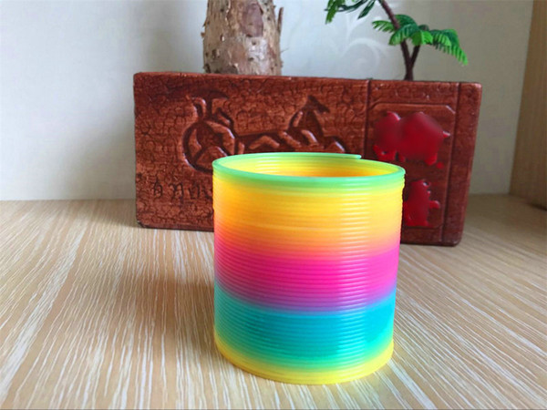 Fashion Rainbow circle Colorful Rainbow Plastic Magic Slinky Kids Children Classic Development Educational Toy Christmas Gifts DHL 96pcs