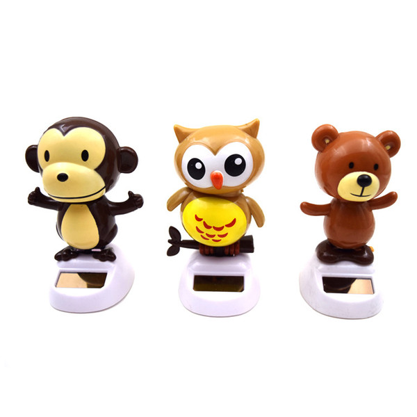 The solar energy pendulum shakes the head the public figure cartoon doll gift child small gift automatic sway strange