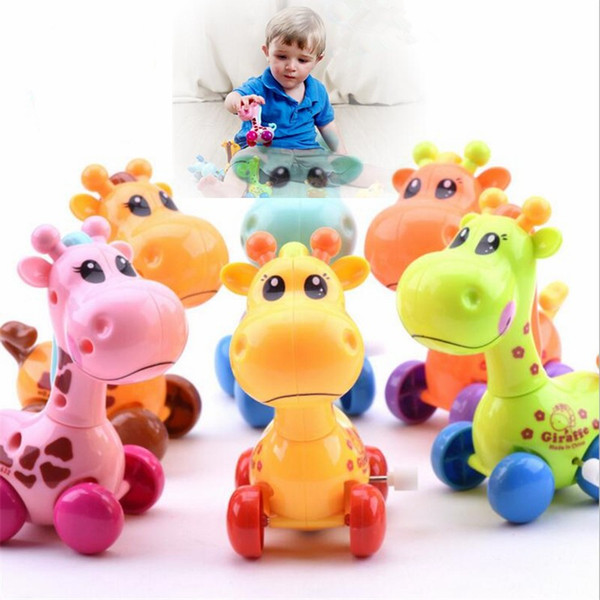 5pcs/lot New Hot Q Version of the Giraffe Winding Spring Toys Strange New Children 0-6-12 Months Baby Toys