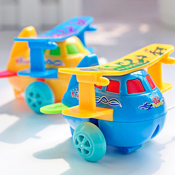 5pcs/lot Baby Clockwork Toys Cartoon Airplane Model Wind Up Toy Running Clockwork Spring Toys for Children
