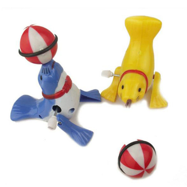 New Creative children's puzzle clockwork cartoon dolphins sea lion walking acrobatic top ball 360 degree rotation toys wind-up gifts