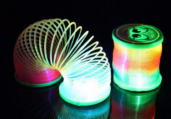 12pcs/lot 2017 Hot lantern rainbow circle cartoon toys design Flash plastic spring coil With the rod and rope luminous lighting