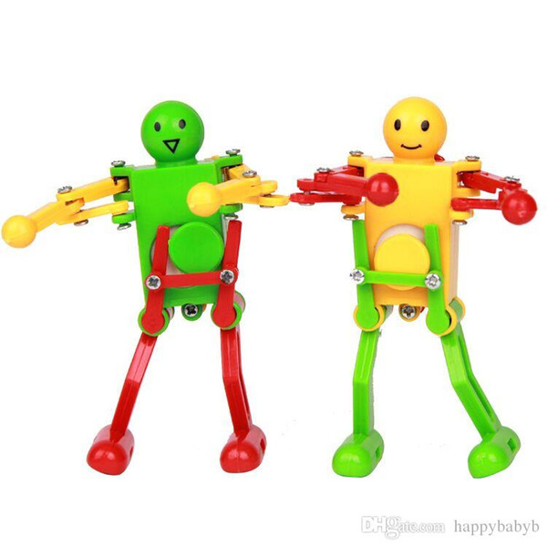 Walking Dancing Robots Toys 360 degrees Clockwork Wind Up Dancing Robot Toy For Baby Kids Developmental Puzzle Toy Christmas New Year Gifts