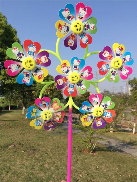 Colorful sequins smiley faces plastic windmills,hot selling cartoon pattern windmill toys six leaf windmill
