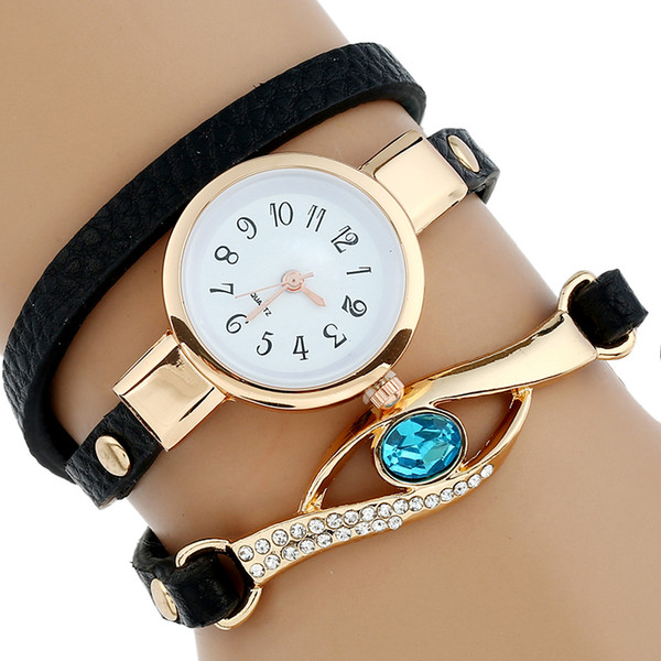 Brand Luxury Watch Women Gold Fashion Eye Crystal Bracelet Wristwatch Vintage Casual Dress Quartz Watch Ladies Clock Watch