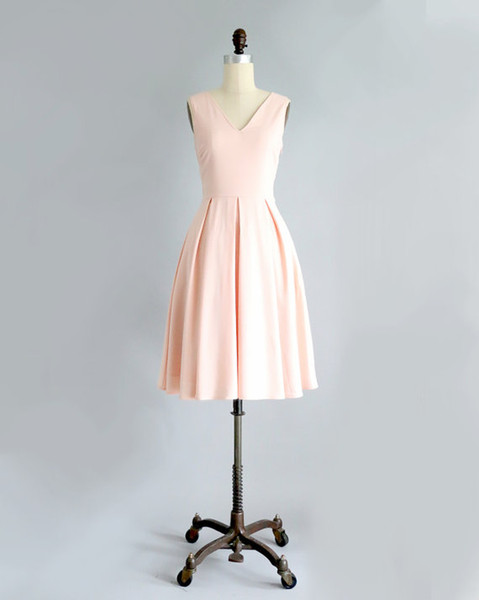 New Blush - Baby Pink Bridesmaid Dress with Bow Vintage Inspired V Neck Cocktail Dress Modest Midi Length Skirt with Full Pleats.