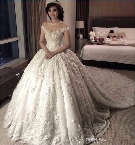 New Luxury Arabic Ball Gown Wedding Dresses Cap Sleeves Lace Appliques 3D Floral Flowers Puffy Train Plus Size Bridal Gowns