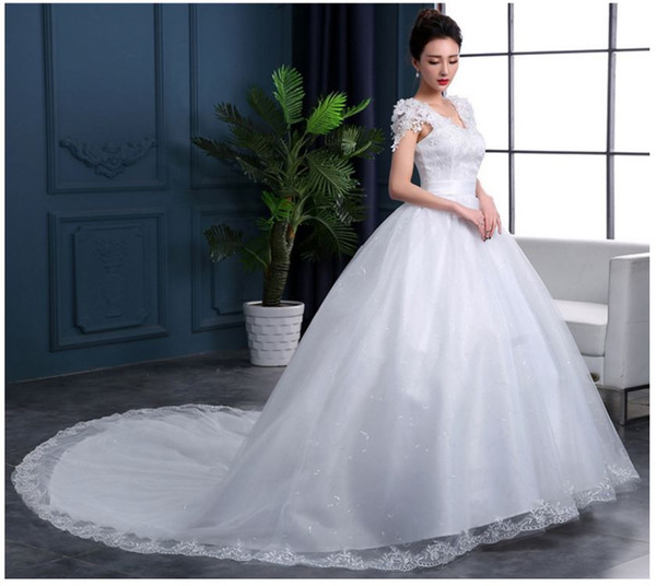 new flowers wedding dress, a thin and slim V shoulder collar dress. Large tail lace bandage size, color white