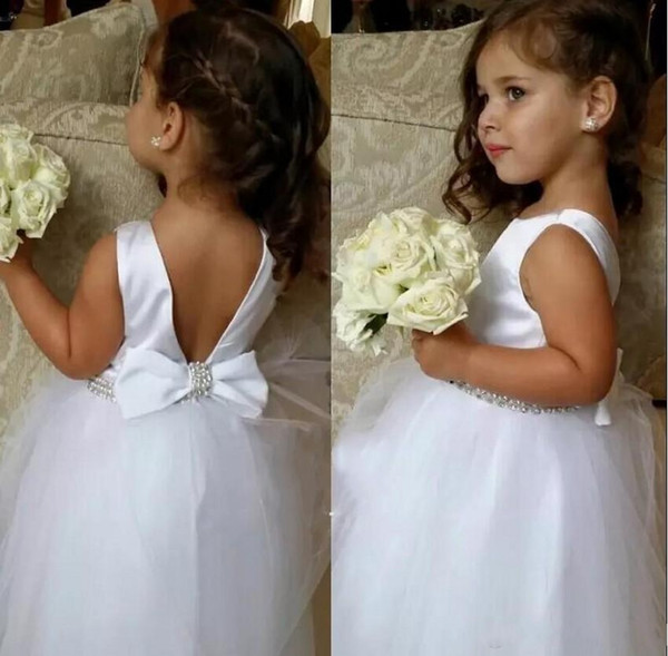 Beautiful White Beaded Tulle Flower Girl Dresses Sleeveless Jewel Open Back With Bow Floor Length Lovely Princess Girls Pageant Gown