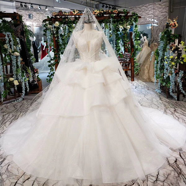 2022Latest Bohemian Wedding Dresses Long Lace Shawl Sexy Illusion Deep V Neck Sleeveless Backless Lace Up Back Sequins Bridal Gowns Beach