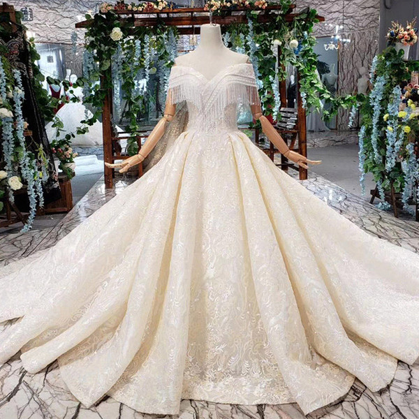 2022Latest Lebanon Wedding Dresses Tassel Beaded Sweetheart Neck Backless Lace Up Back Short Sleeve Applique Pattern Bridal Gowns Garden