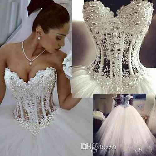 2016 Ball Gown Wedding Dresses Sweetheart Corset See Through Floor Length Princess Bridal Gowns Beaded Lace Pearls Custom Made