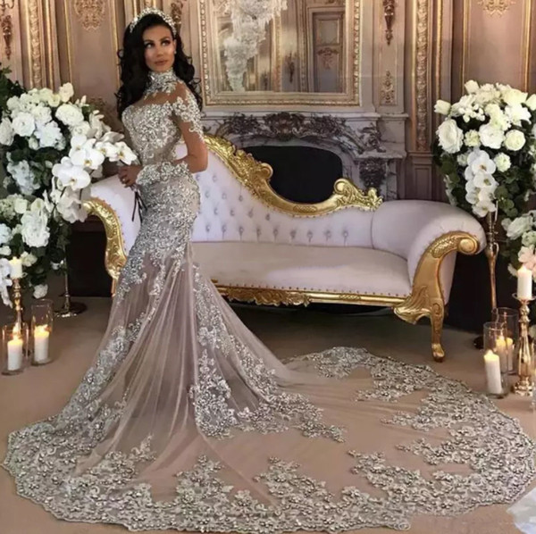 Dubai Arabic Luxury Sparkly Wedding Dresses Sexy Bling Beaded Lace Applique High Neck Illusion Long Sleeves Mermaid Vintage Bridal Gown