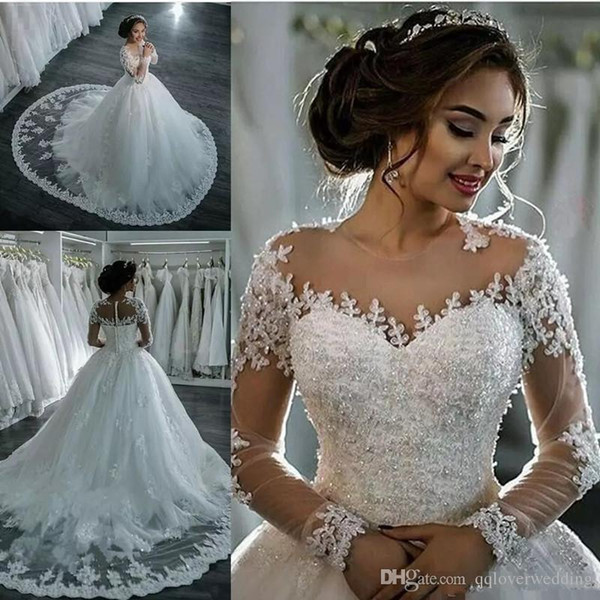 Amazing Sheer Neck Wedding Dresses Lace Appliques Beads Illusion Long Sleeves Bridal Gowns Ball Gown Sweep Train Custom Made Wedding Dress