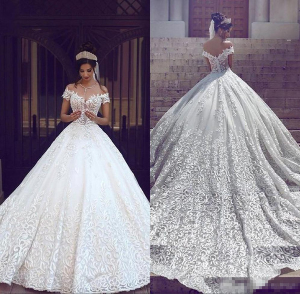 2017 Saudi Arabic Dubai Luxury Short Sleeves Wedding Dresses Off Shoulder Appliques Backless with Sweep Train Bridal Gowns Robe de marriage