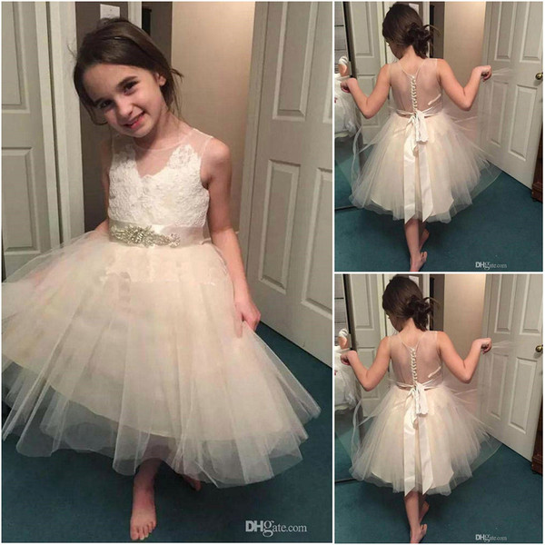 Designer High Quality Champagne Girls Dresses Sheer Jewel Neck Buttons Back Lace Bodice Bow Sash Tea Length Girls Party Gowns