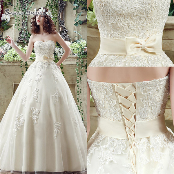 Ball Gown Sleeveless Lace Up Sweetheart Appliques Bow Sweep Train Sleevless Tulle Wedding Bridal Gowns SQS039