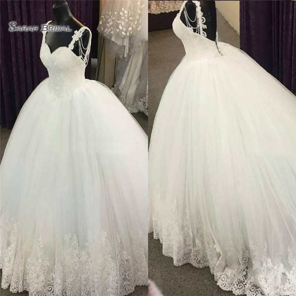 Luxury Ball Gown Wedding Dresses Sweetheart Spaghetti Straps Crystal Beaded Tulle Plus Size Wedding Dresses Backless Bridal Dresses