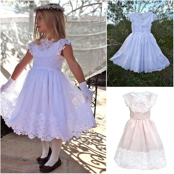 Latest White Lace Girls Holy Communion Gowns Boat Neck Cap Sleeves Buttons Back Tea Length Bow Belt Flower Girls Dresses